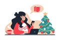 Woman answers a message and buys gifts for the family in an online store. New Year`s and Christmas online shopping from home